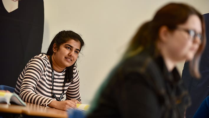 Student in Crescent Building on the Priestley College campus.