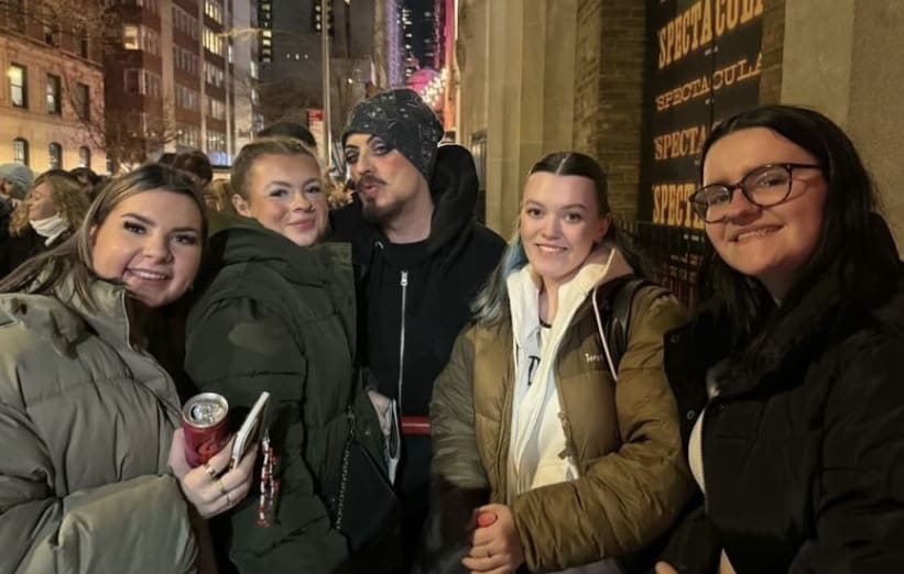 Students meeting celebrity Boy George
